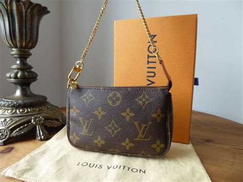 lv mini pochette accessoires monogram|louis vuitton monogram metis.